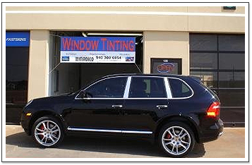 Auto Window Tinting in Denton, TX | FlexShield Window Tint & Car Audio | Blue SUV with Tinted Windows